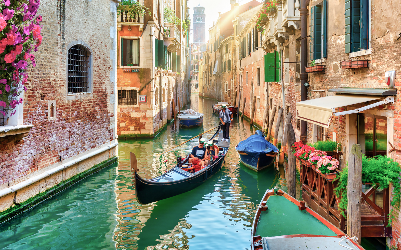 iconic couple getaways Venice gondola ride
